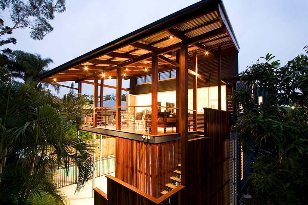 Image of a well lit timber home designed with sustainable elements by eco architects Brisbane